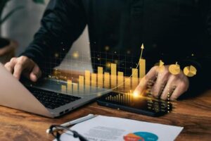 businessman working with laptop and smartphone virtual dashboard analyzing finance sales data and economic growth graph chart photo